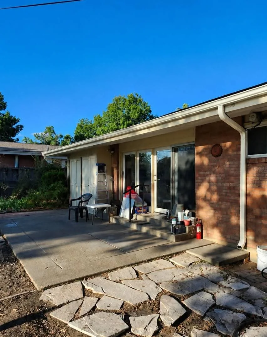 Completed rear patio exterior after the roof and exterior project