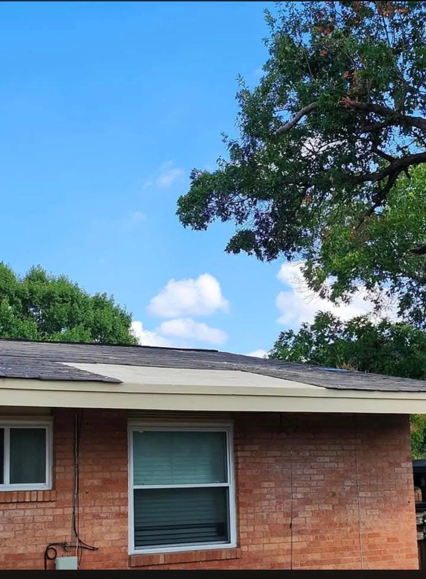 Existing roof surface on the home before replacement