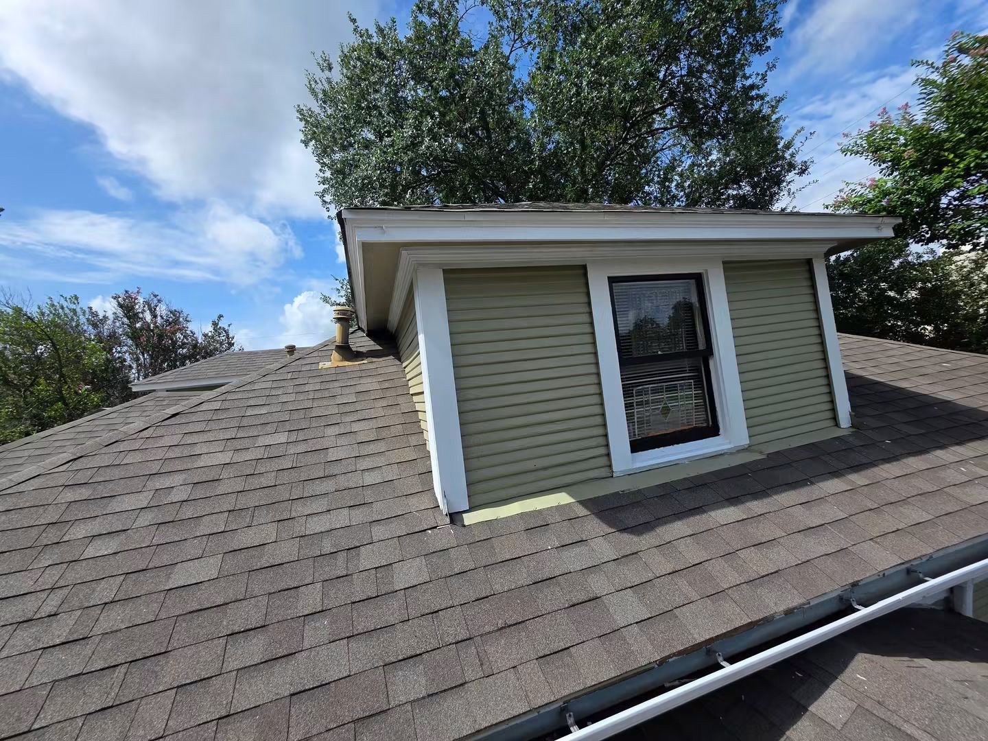 Finished dormer with defined window and trim contrast