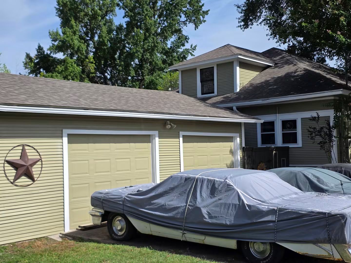 Finished garage-side exterior from the matching before angle
