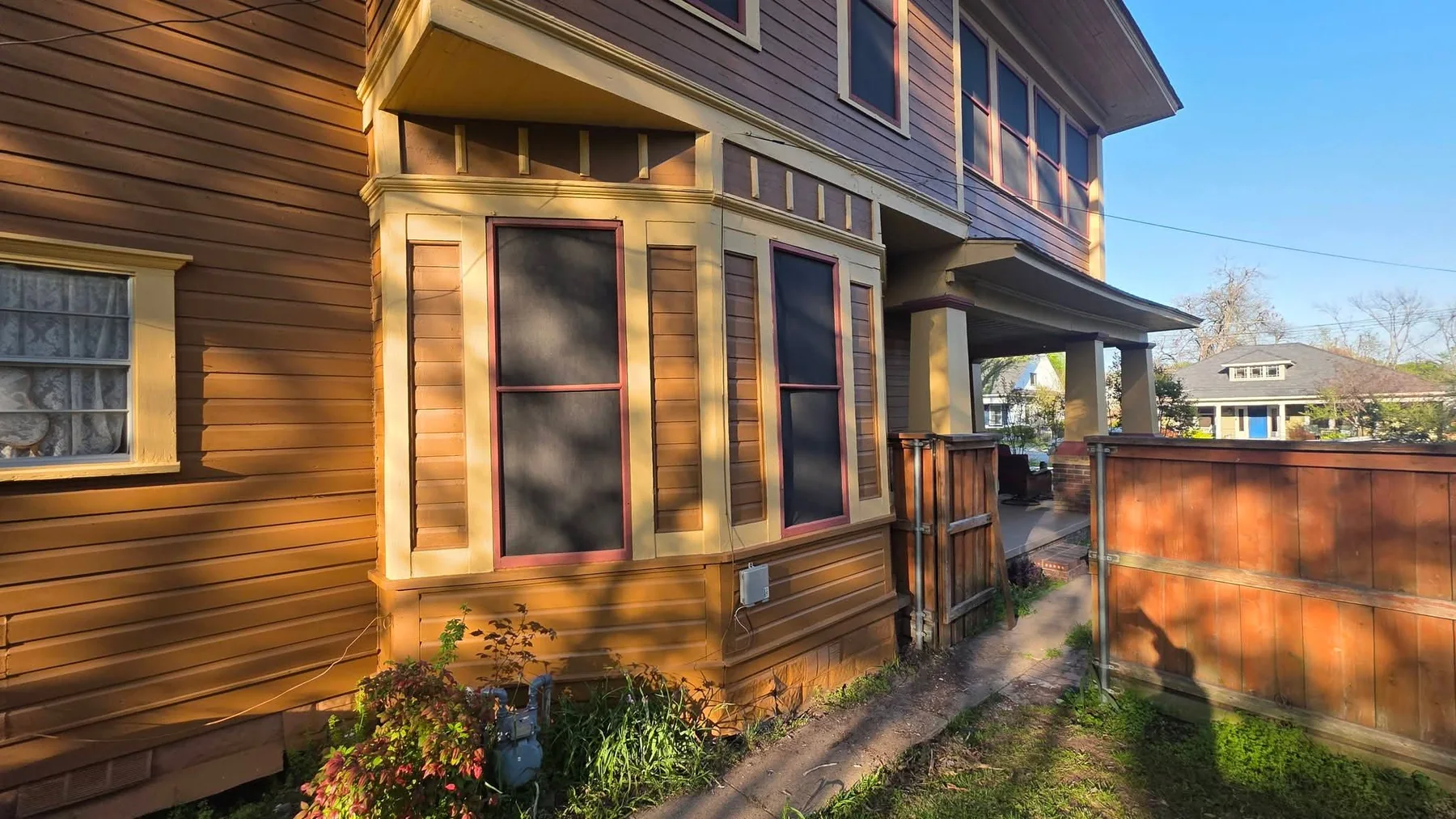 Finished projecting bay-window section after exterior rebuilding and painting
