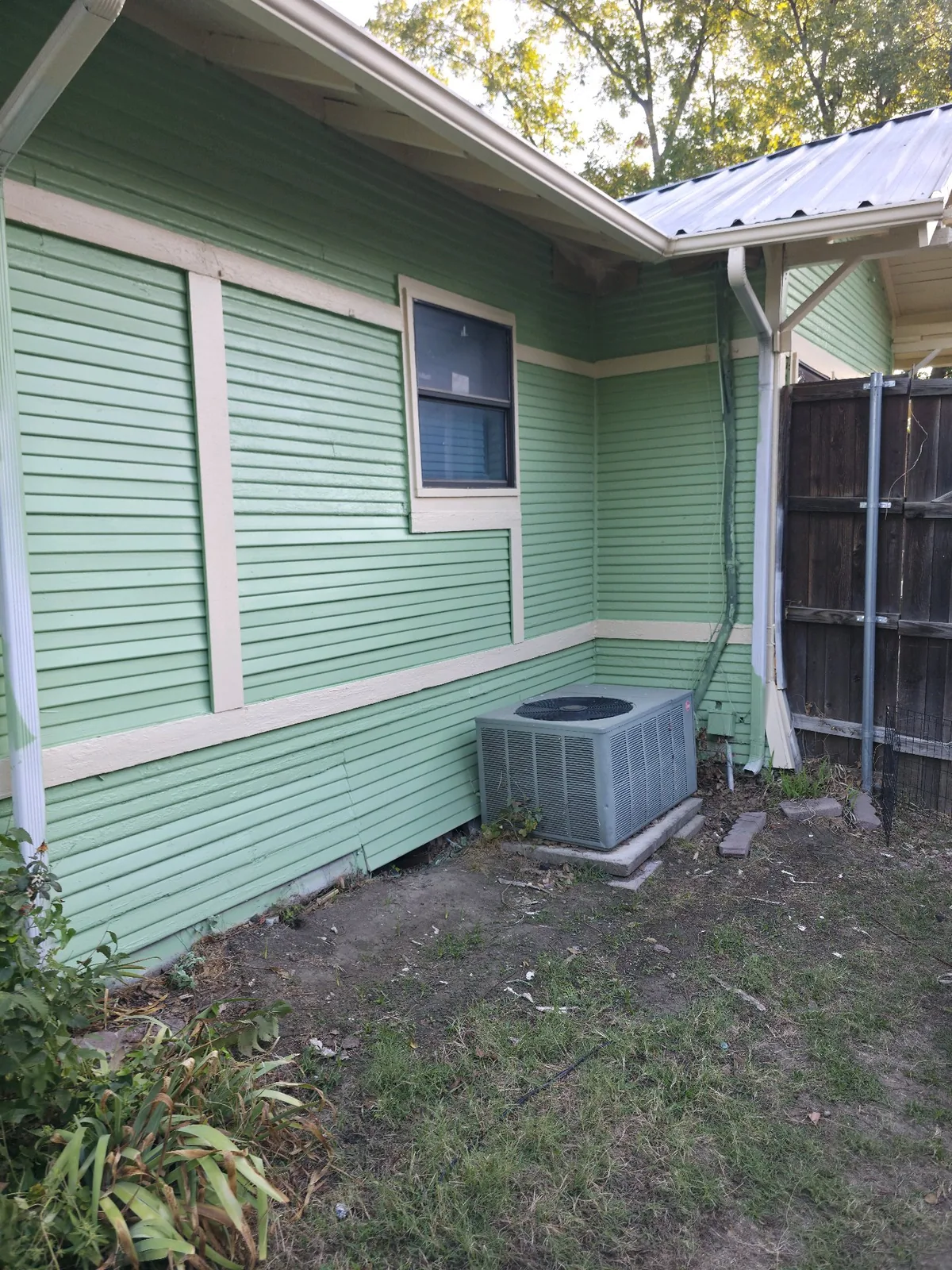 Finished green side wall with cream trim bands