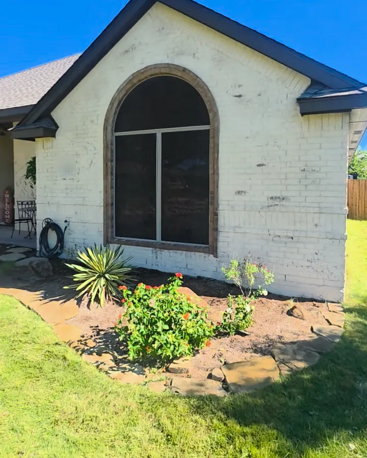 The same arched front window after Romabio limewash in Riposo Beige