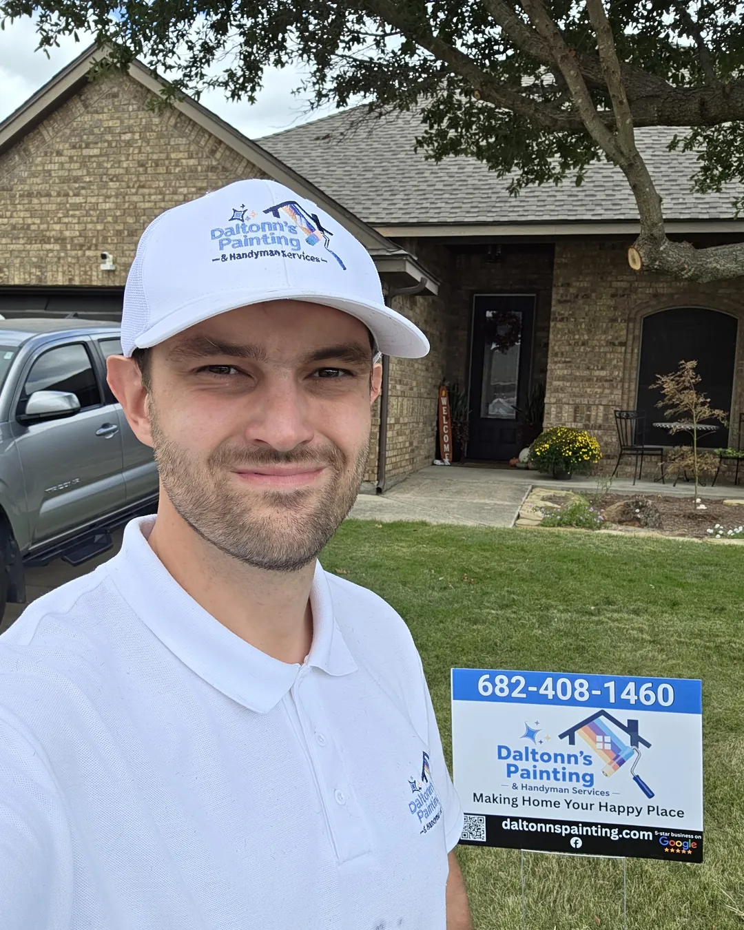 Daltonn in front of the house before the limewash, next to his Daltonn’s yard sign