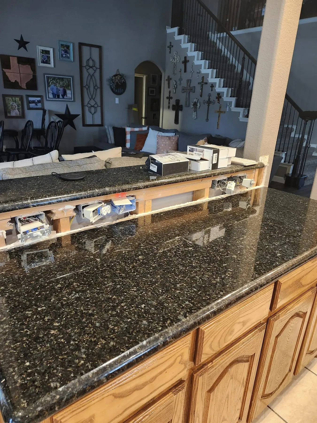 Original warm wood island and cabinet run before painting