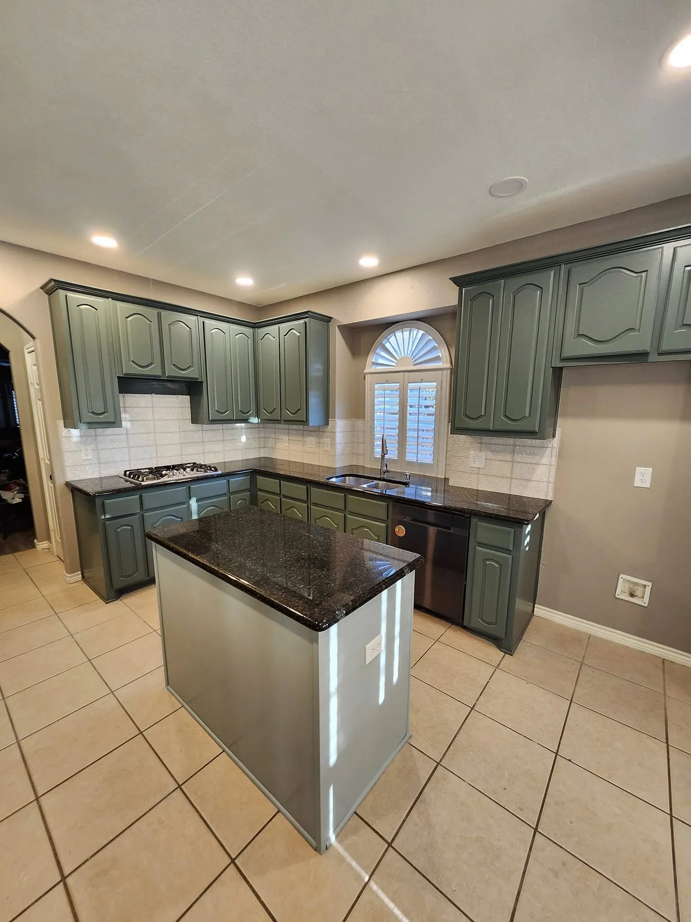 Completed kitchen viewed across the island