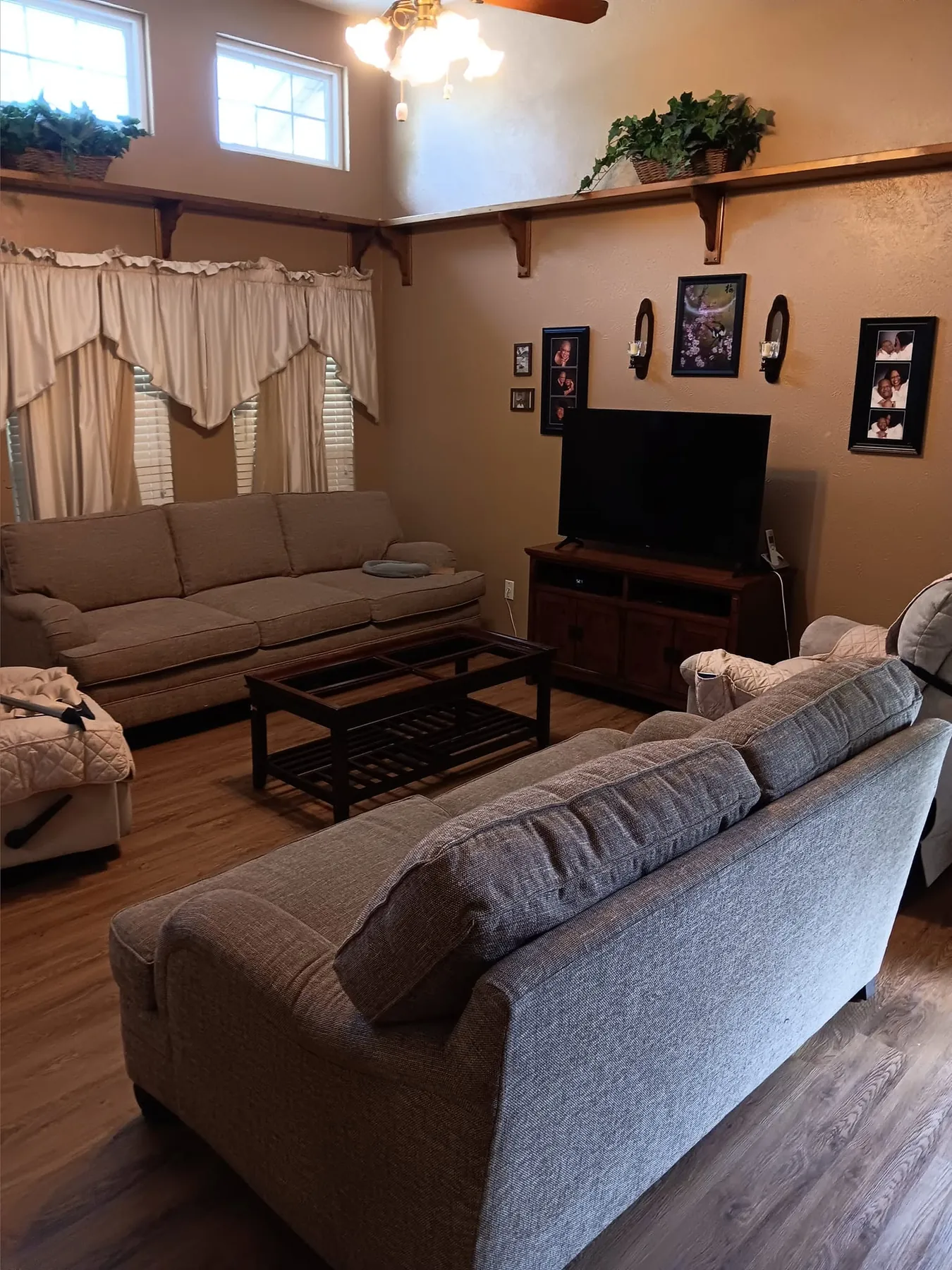 Completed wood-look flooring across the main living room