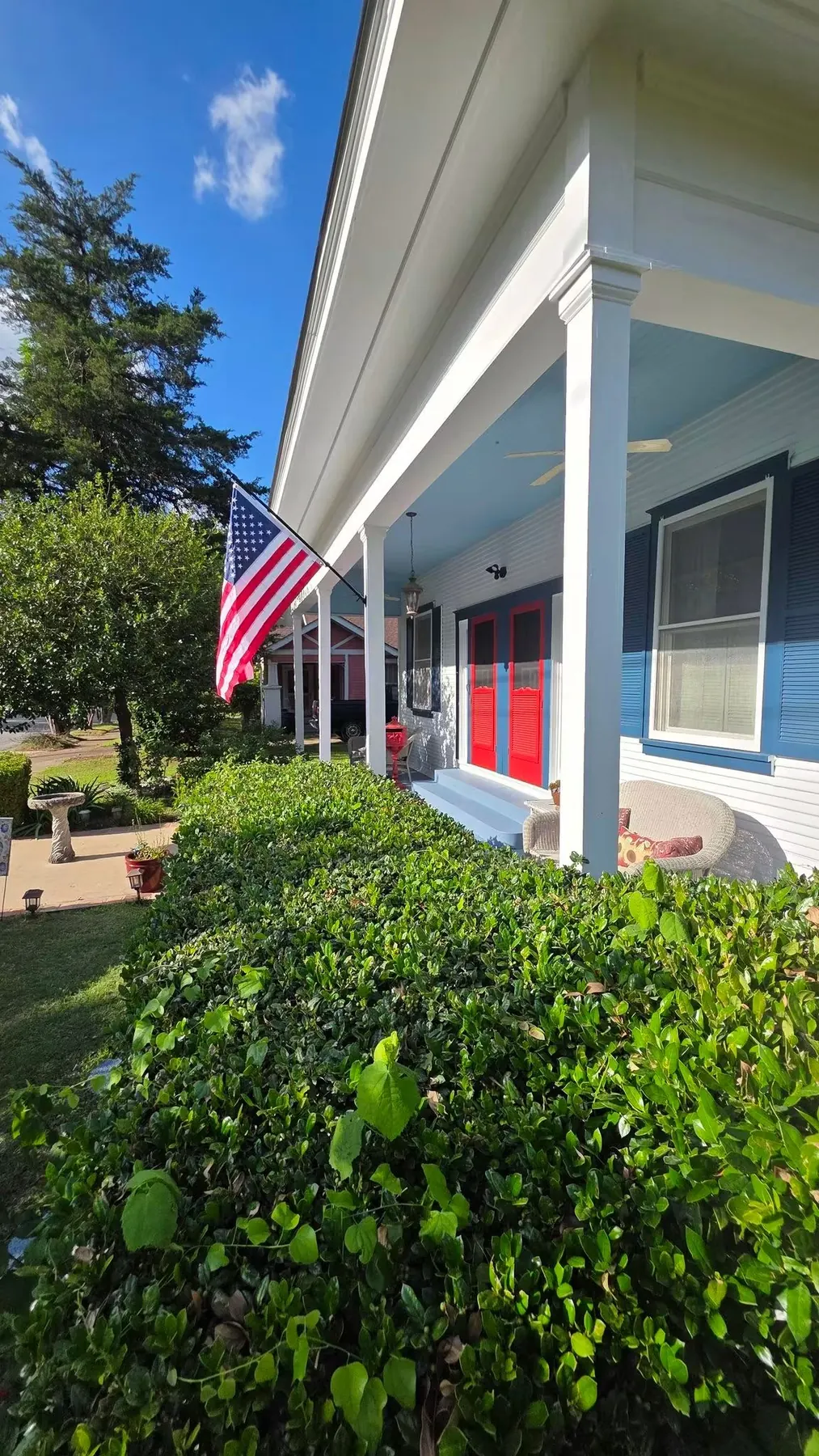 Finished custom wood porch column wraps and trim on a historic home