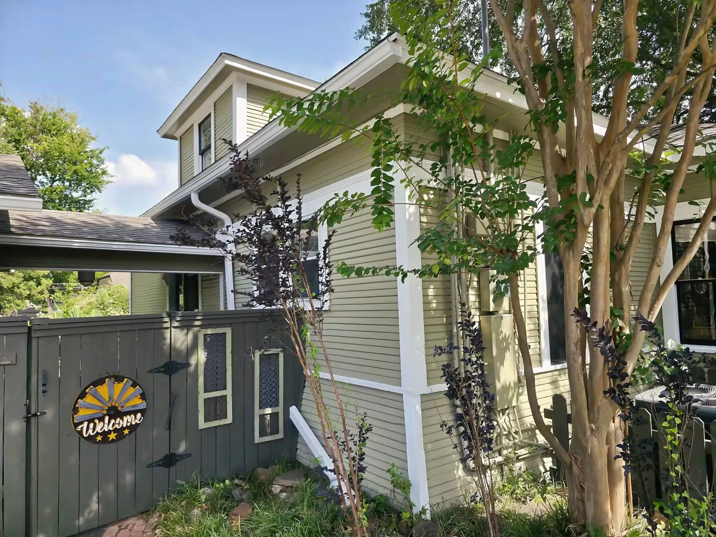Finished side elevation with restored lower wall, siding, windows, and trim