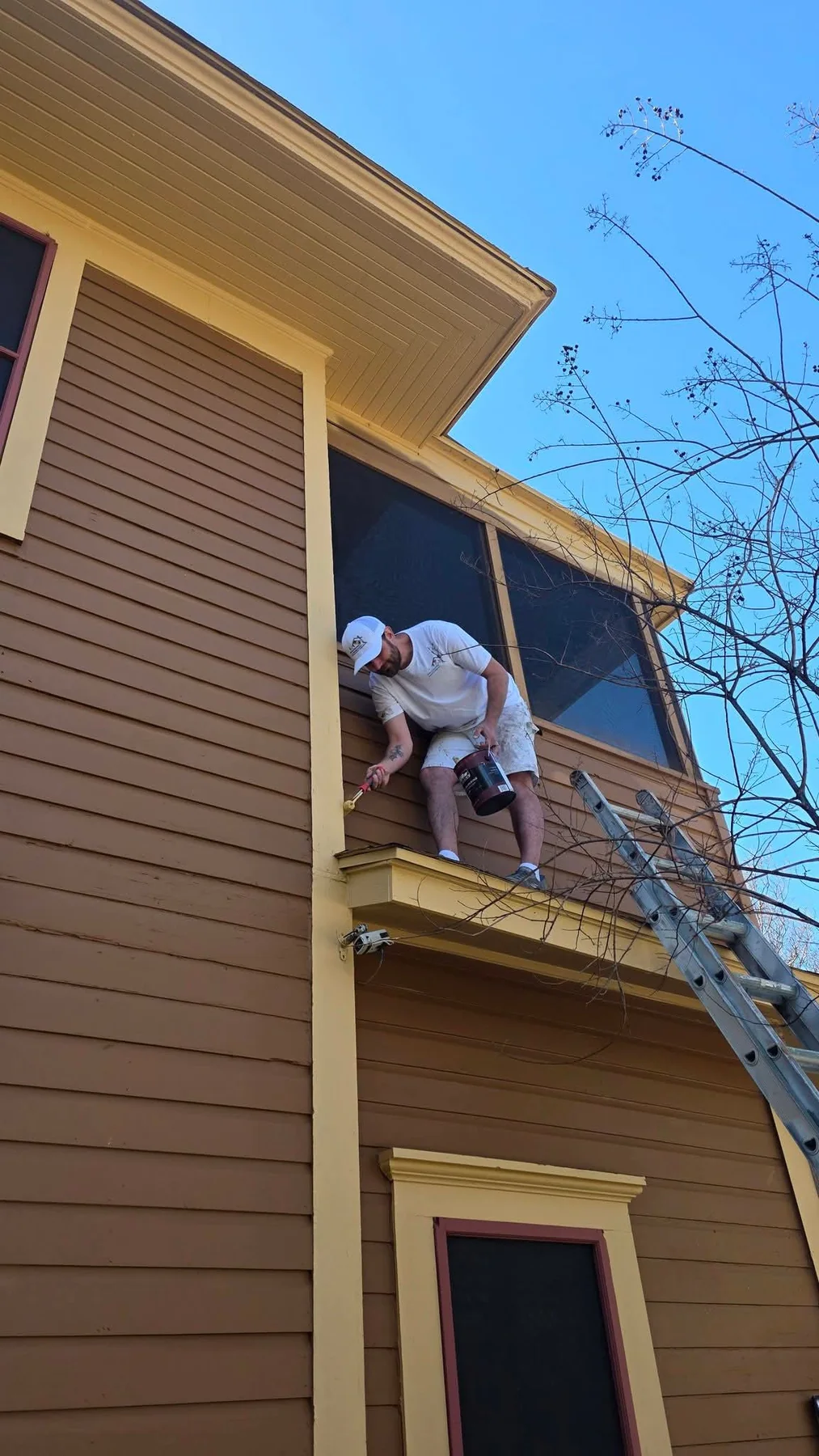 Upper exterior trim receiving detailed brushwork
